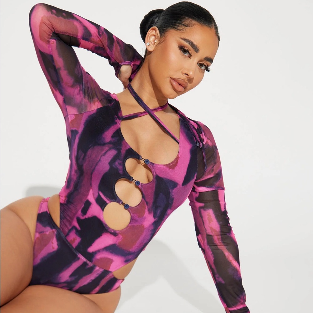 Button up mesh purple bodysuit 
Never worn